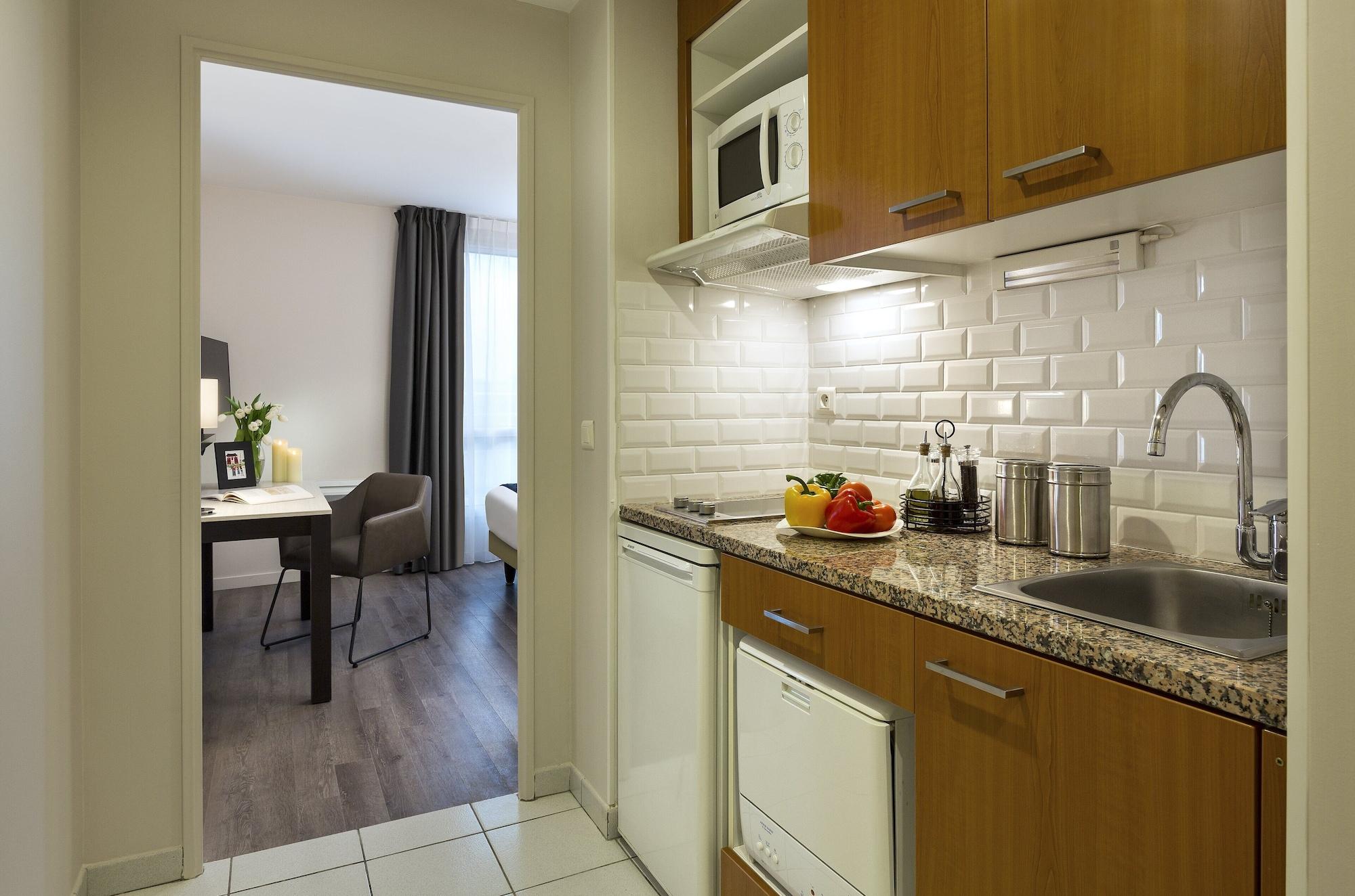 Aparthotel Citadines Montmartre Parigi Esterno foto