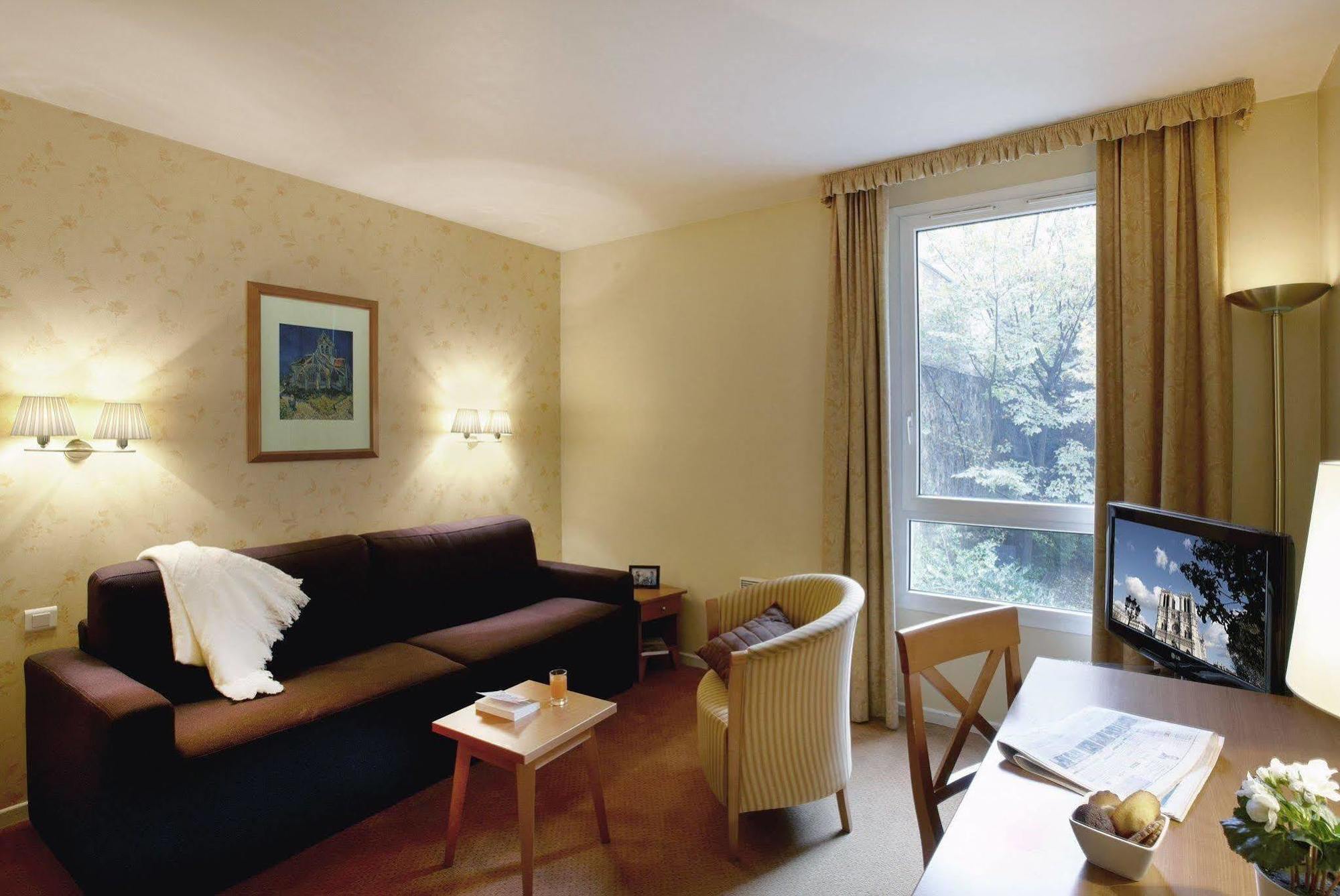 Aparthotel Citadines Montmartre Parigi Esterno foto